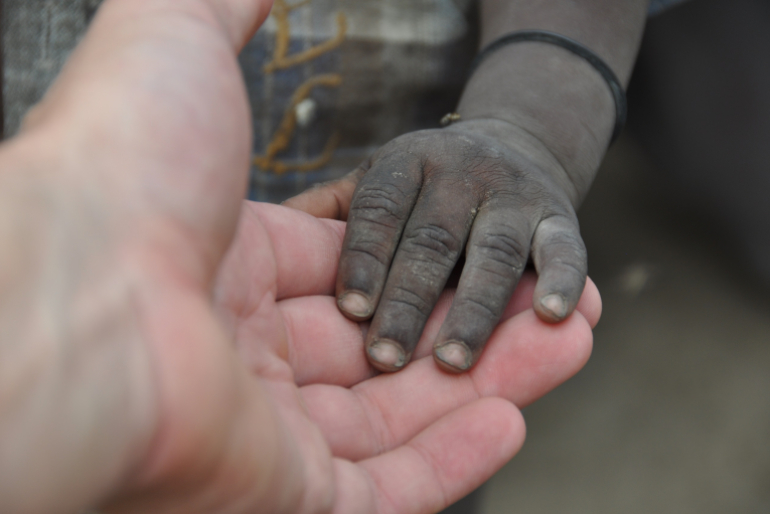 Die Hand reichen