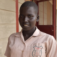 Elizabeth Nyigang ist glücklich, die Loreto-Schule in Maker Kuei besuchen zu dürfen. Die 16-Jährige freut sich, hier nicht nur etwas zu lernen, sondern auch Essen zu bekommen.